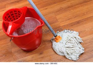 cleaning-of-floors-by-mop-and-red-bucket-with-washing-water-db140c